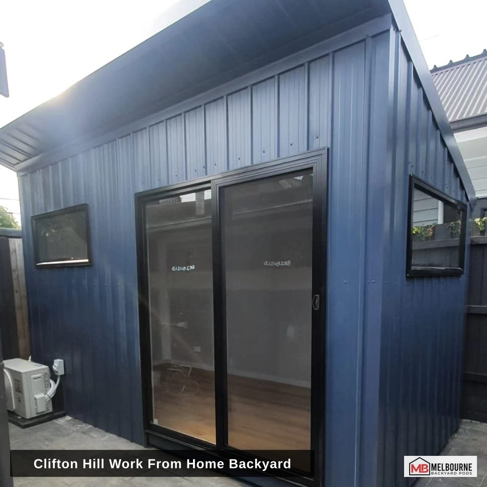 Interior of a Clifton Hill work from home pod with desk setup and natural light